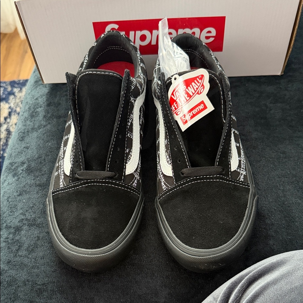 Supreme Black and White Slip-On Sneakers